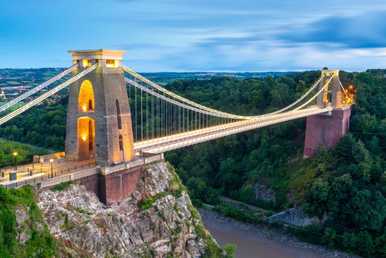 Clifton Suspension Bridge spanning the Avon Gorge at dusk in Bristol