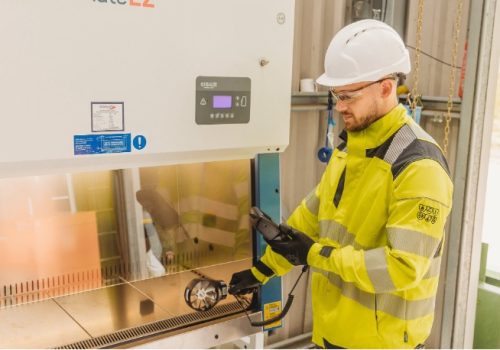 Armstrong Environmental specialist carrying out airflow testing on a biological safety cabinet